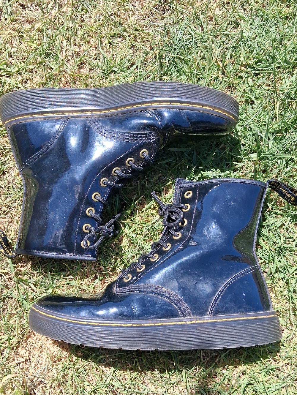 Dr. Martens Black Patent Lace-Up Boots with Yellow Stitching